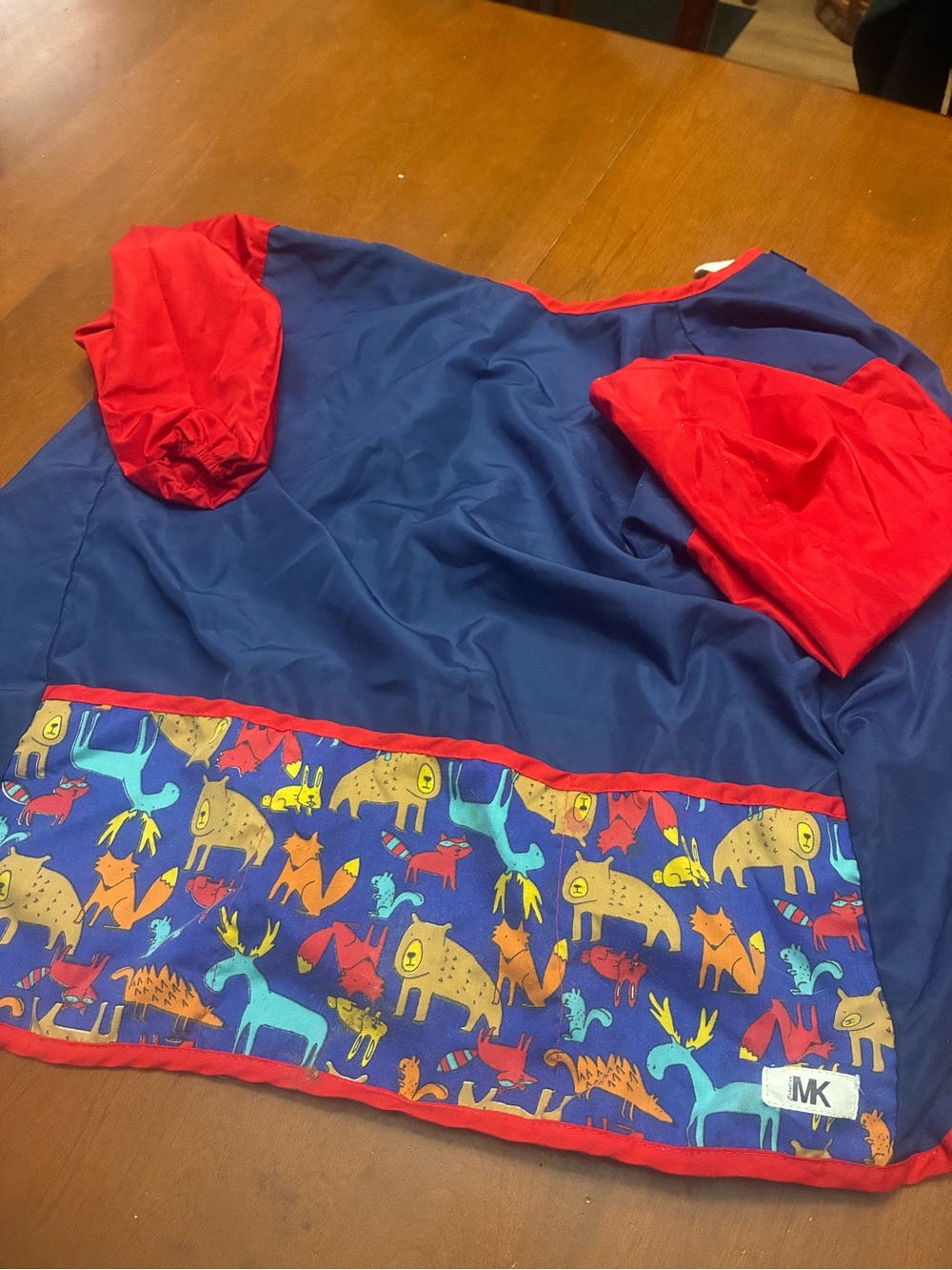 Kids Navy and Red Reversible Raincoat with Playful Animal Trim